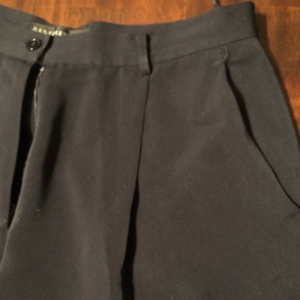 Black loss fitting trousers